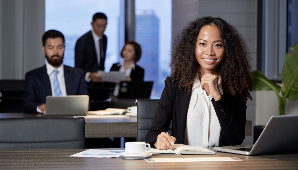 Smiling businesswoman at work in an office