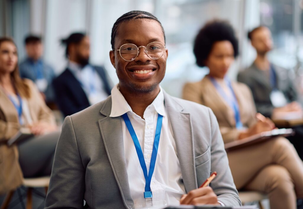 Young black man attending a professional event or conference